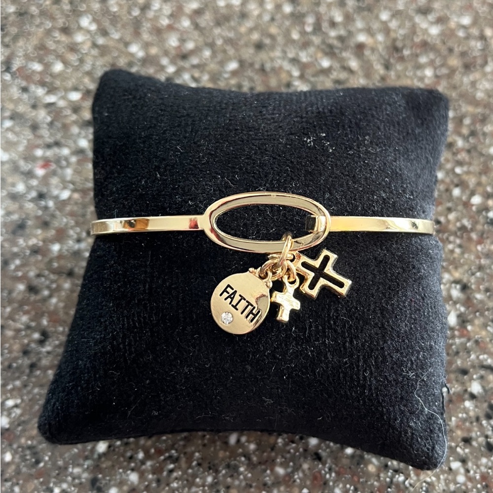 Faith gold clasp bracelet.